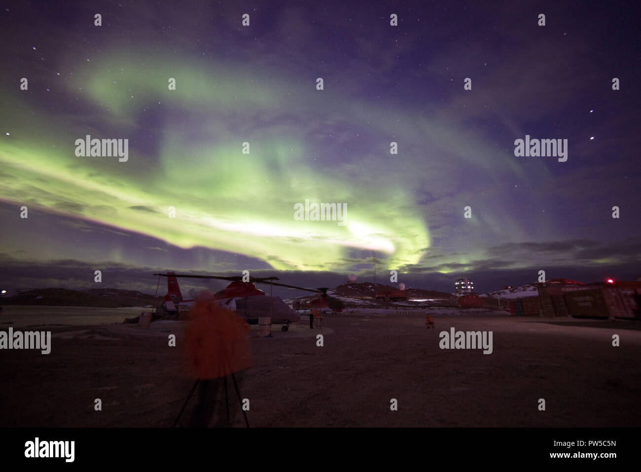 Bright colorful northern lights in the night sky. Antarctica Stock