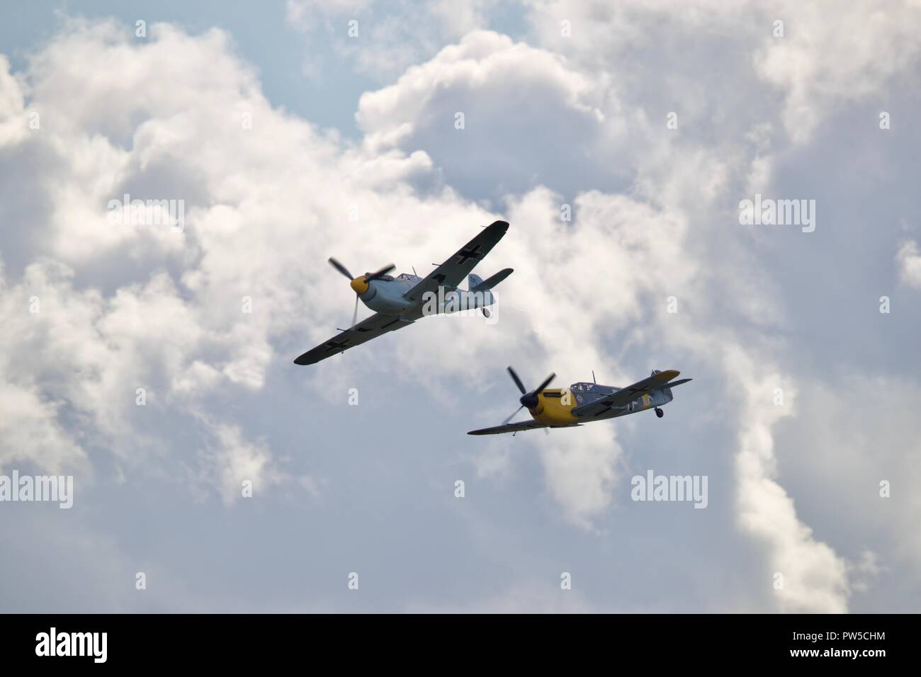 Pair of Hispano HA-1112 M4L Buchons (Messerschmitt Bf 109) flying at the IWM Duxford Battle of Britain Airshow on the 23 September 2018 Stock Photo