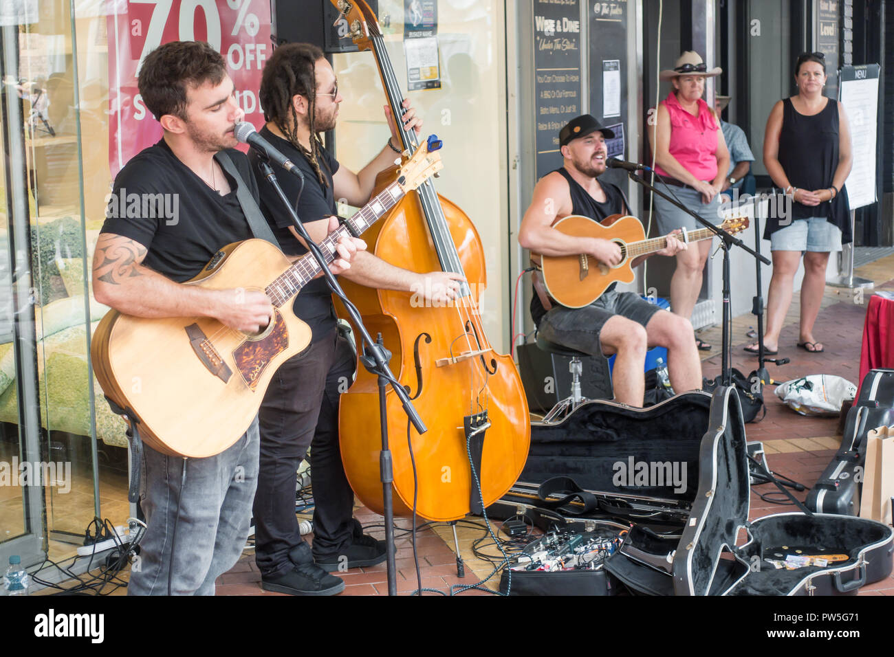 Musical trio busking at 46th annual Country Music Festival,Tamworth Australia. Stock Photo