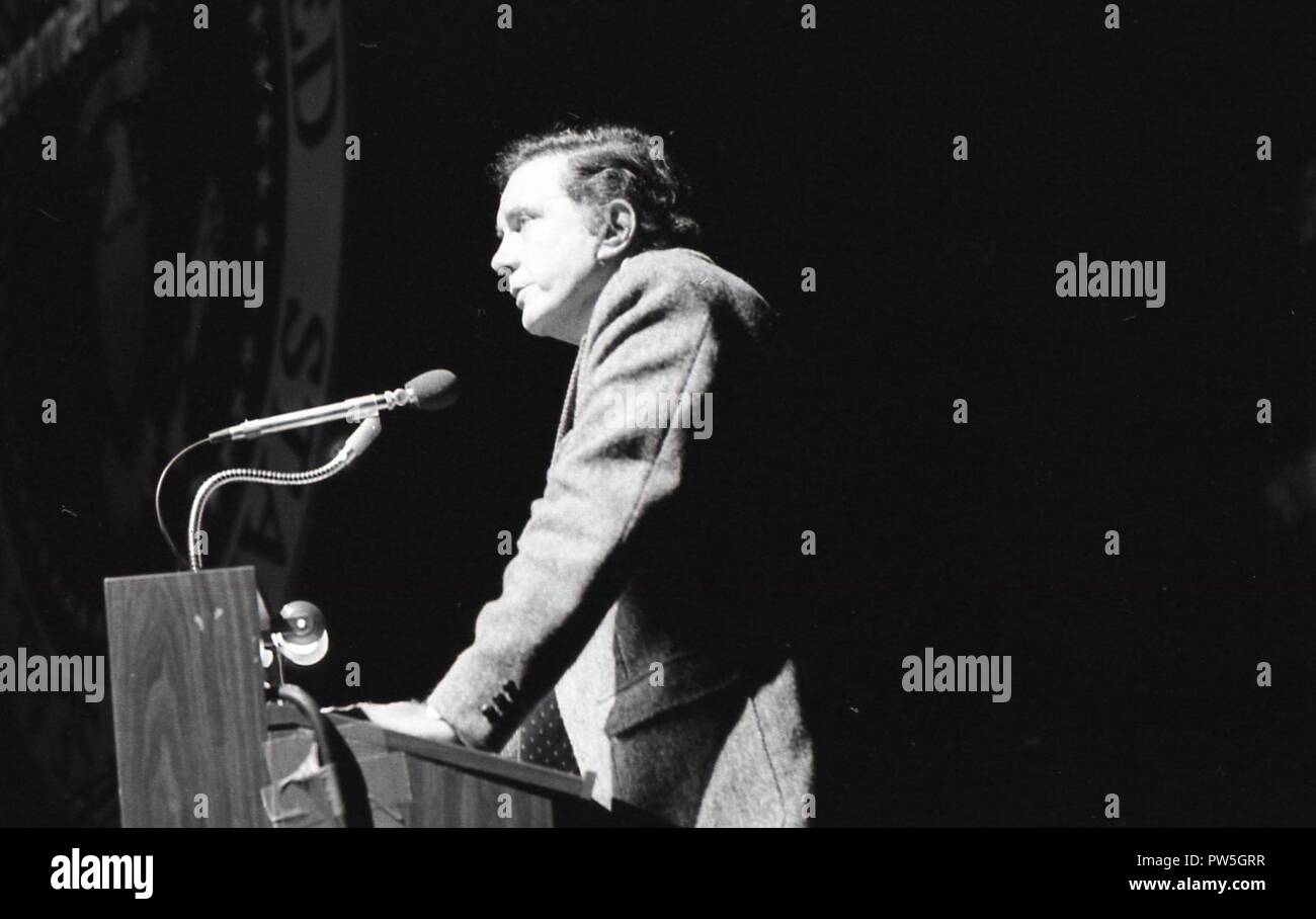 Black and white photo of a man speaking from a podium Stock Photo - Alamy