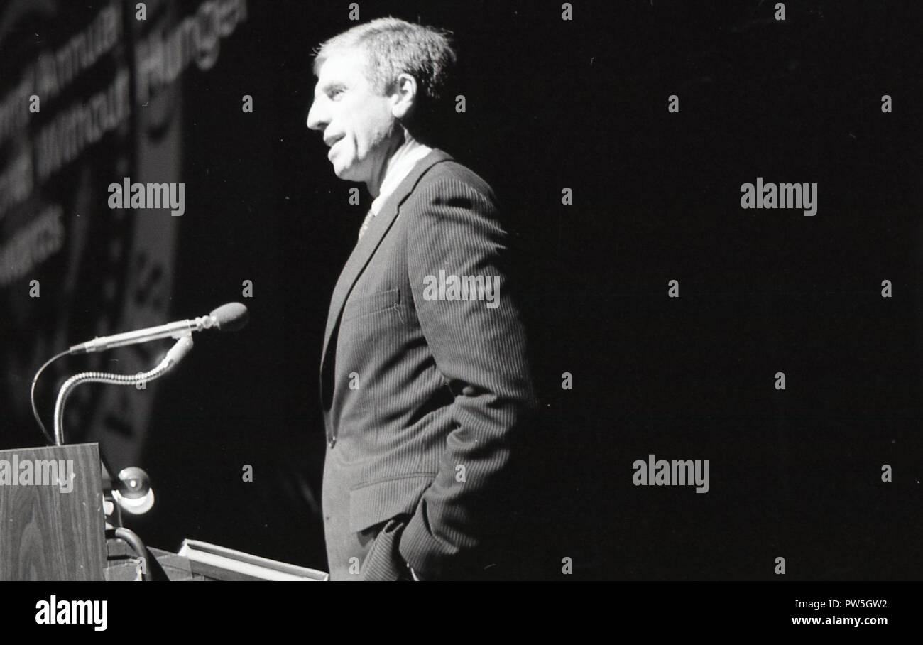 Black and white photo of a man speaking from a podium Stock Photo - Alamy