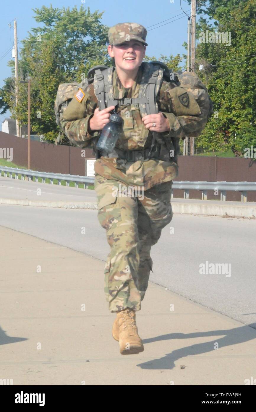 2nd Lt. Melissa Clough finishes her ruck march as the first female to ...
