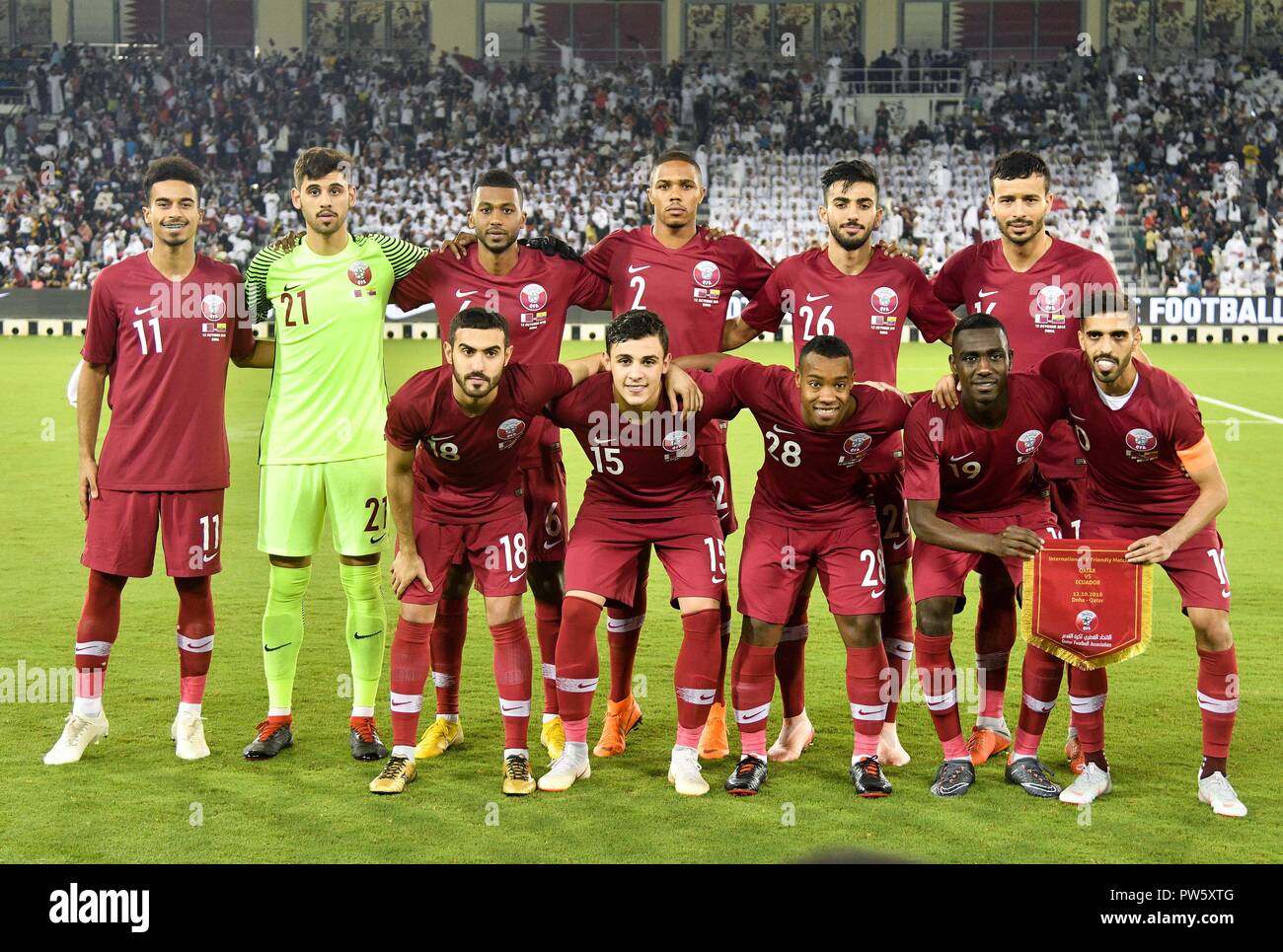 Doha, Qatar. 12th Oct, 2018. Qatar soccer team line up prior to an international friendly soccer match between Qatar and Ecuador in Doha, Qatar, Oct. 12, 2018. Qatar won 4-3. Credit: Nikku/Xinhua/Alamy Live News Stock Photo