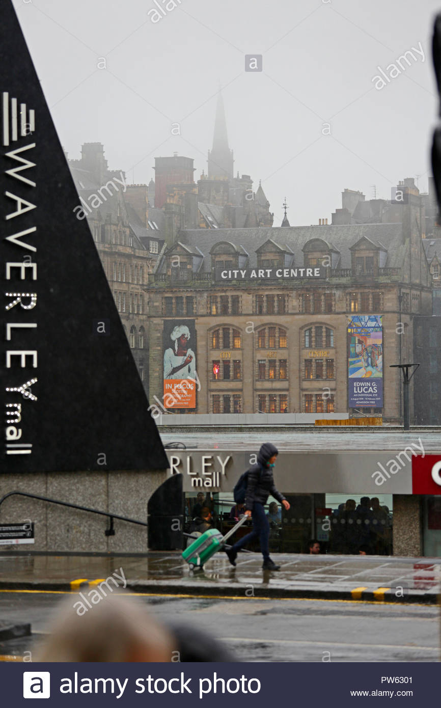 Edinburgh, United Kingdom. 13th October, 2018. UK Weather: Heavy rain affecting Princes Street and Waverley Mall, Edinburgh City Centre. Credit: Craig Brown/Alamy Live News. Stock Photo