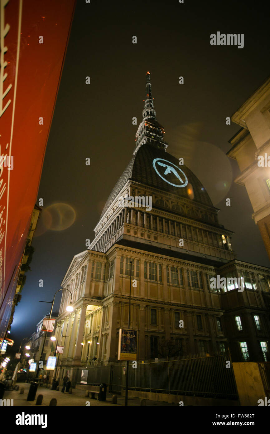 Turin, Italy. 11th Oct, 2018. Aphex twin logo appears on the Mole Antonelliana, symbol of Turin before the Club to Club festival where he will perform one of three world show Credit: Daniele Baldi/Pacific Press/Alamy Live News Stock Photo
