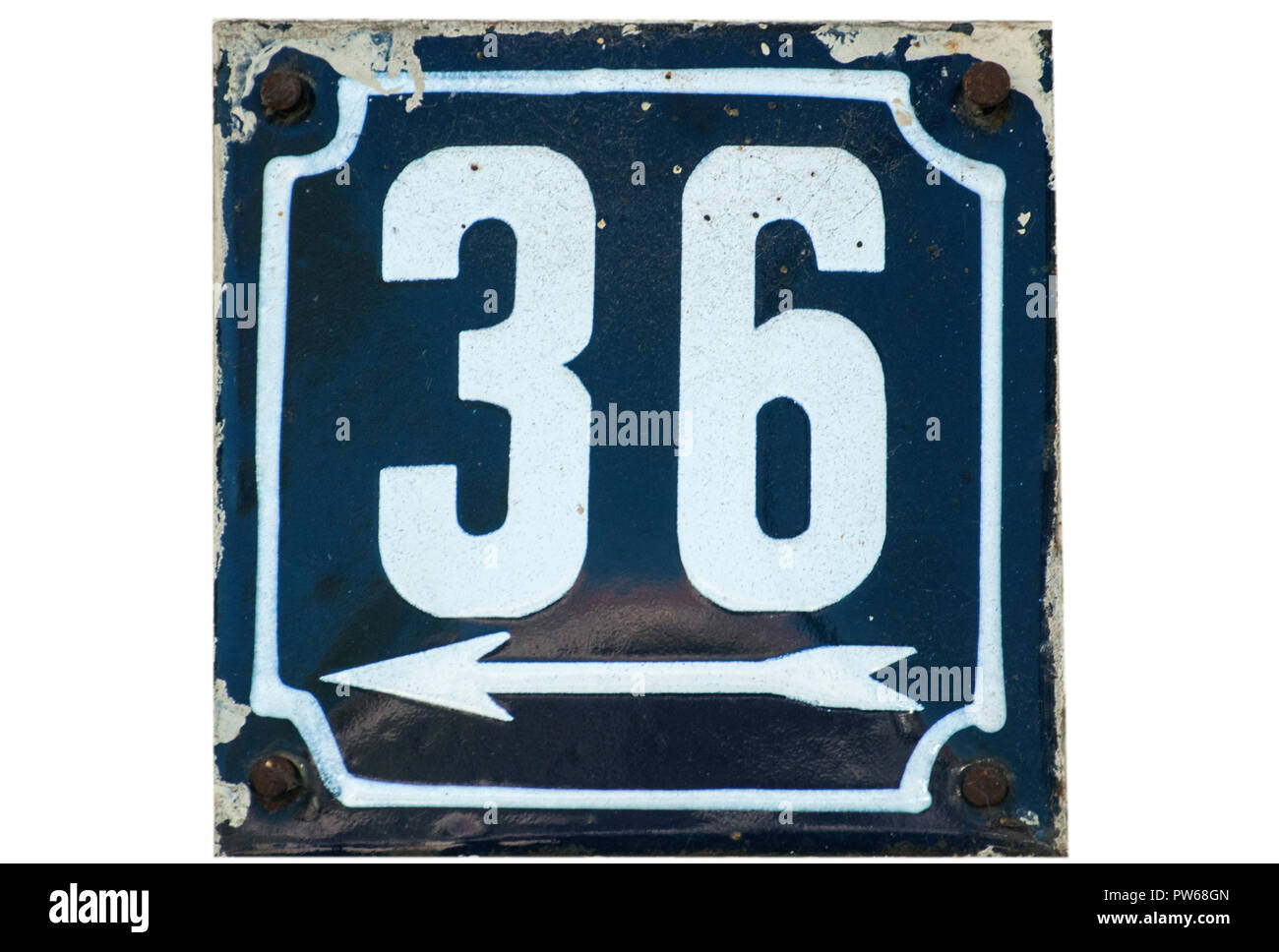 Weathered grunge square metal enameled plate of number of street address with number 36 closeup isolated on white background Stock Photo