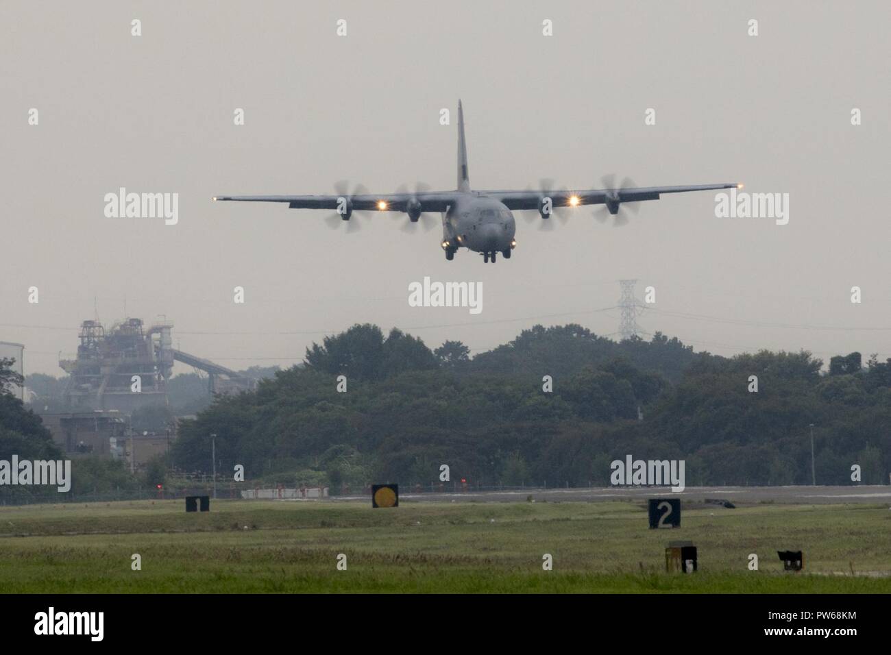 A C-130J Super Hercules approaches the runway at Yokota Air Base, Japan, Sept. 20, 2017. This is the fifth C-130J delivered to Yokota and the first from Ramstein Air Base, Germany. Crewmembers from the 36th Airlift Squadron flew halfway around the world to deliver this C-130J here. Stock Photo