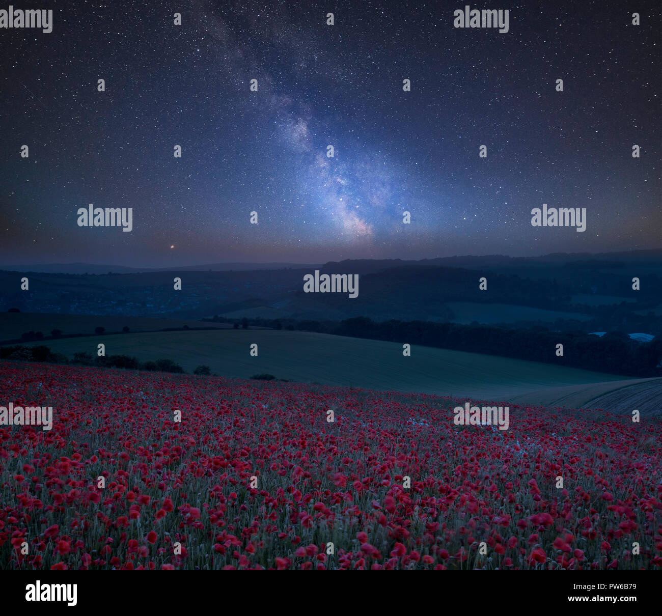 Stunning vibrant Milky Way composite image over landscape of Beautiful ...