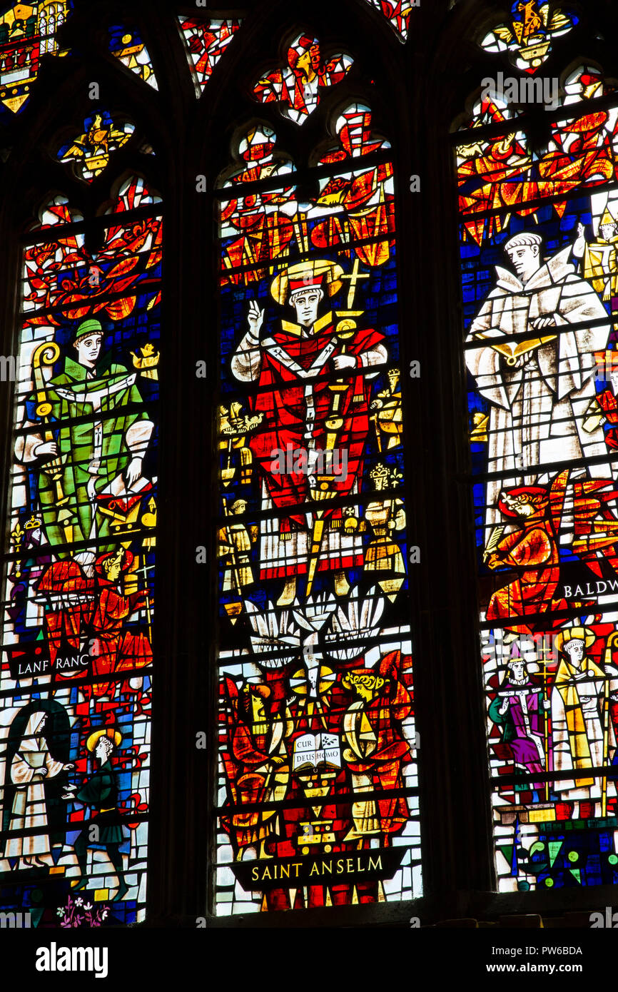 UK, Kent, Canterbury, Canterbury Cathedral interior, Saint Anselm’s Chapel, 14th century Decorated Gothic stained glass window, with 1959 replacements Stock Photo