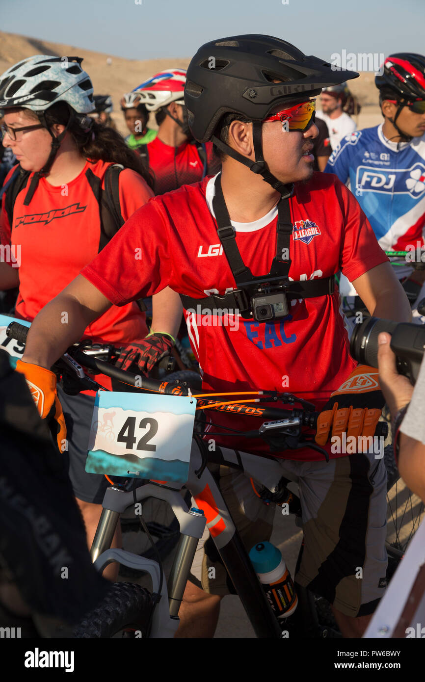 Mountain Bike Race, Cross country, a cyclist wearing a gopro on his chest.  Muscat, Oman Stock Photo - Alamy