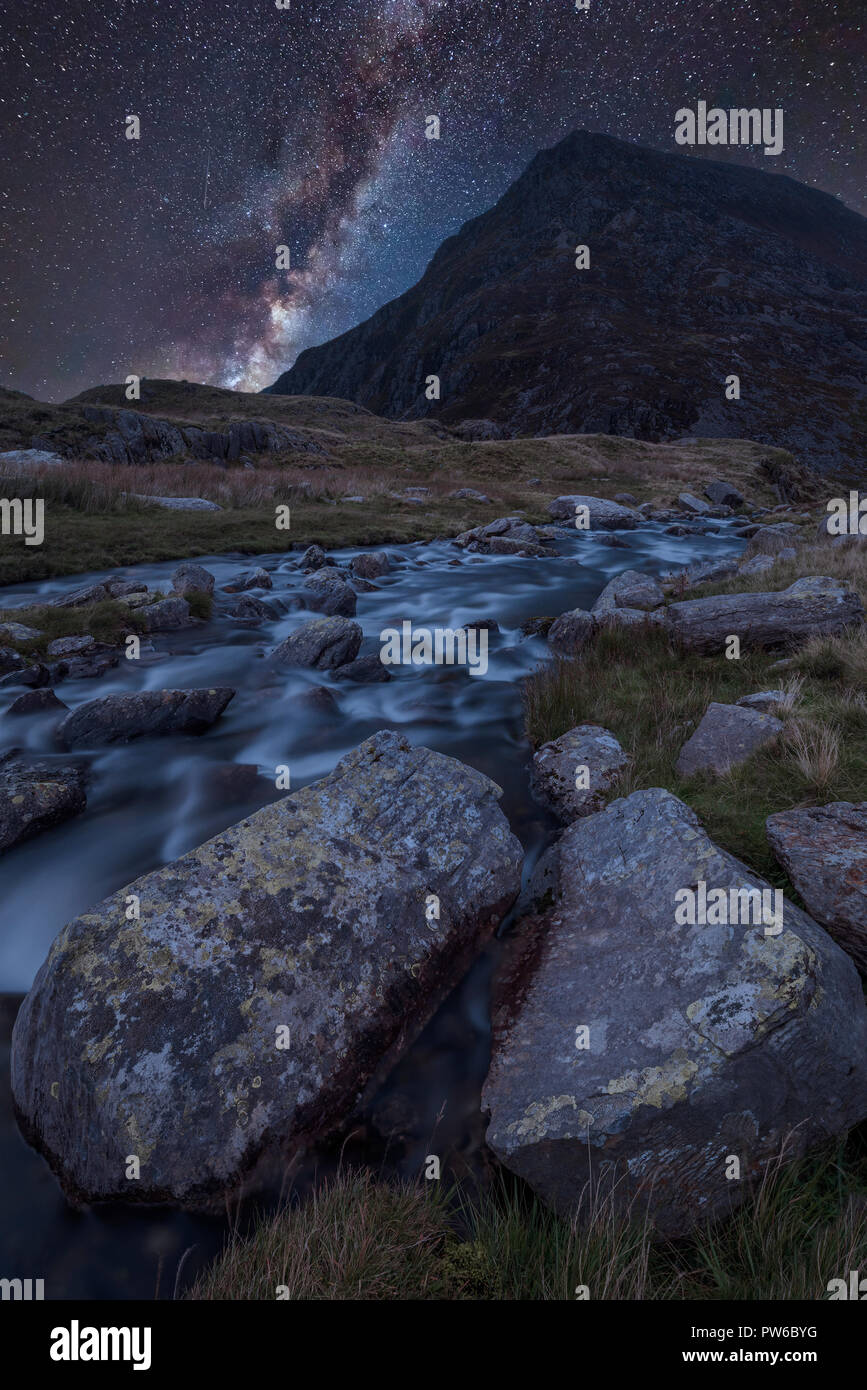 Stunning vibrant Milky Way composite image over Landscape image of ...