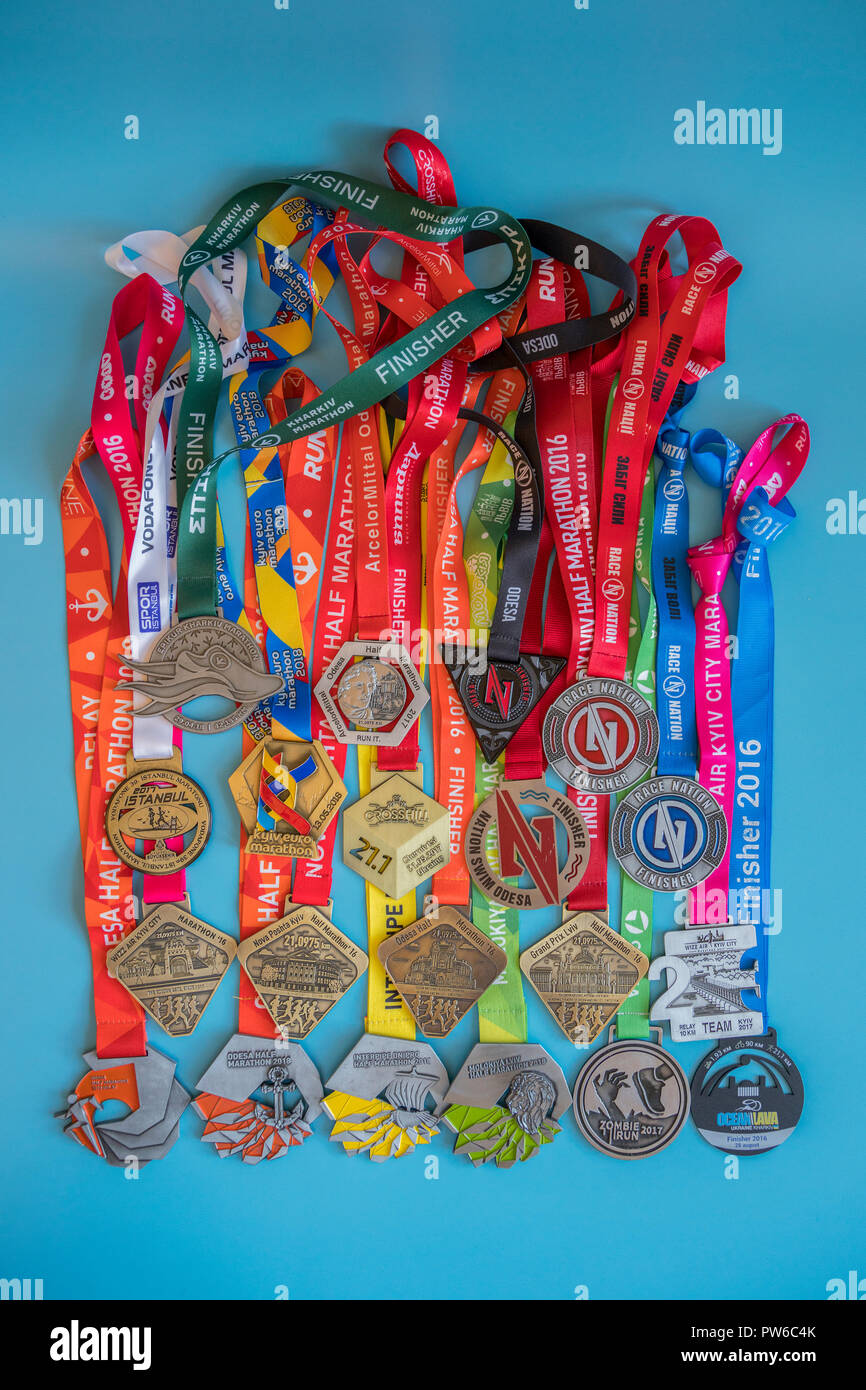 Kiev, Ukraine. September 2 2018 Many different sports medals on a blue