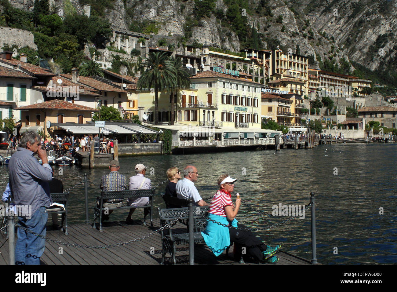 People relaxing on holiday Limone  sol Grada, Lake Garda Italy Stock Photo
