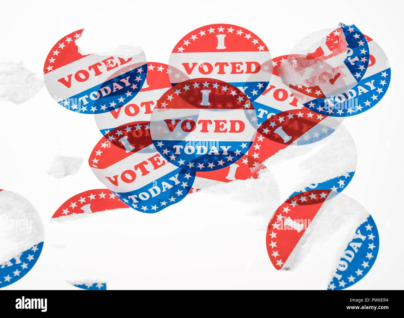 Torn and defaced I Voted Today paper stickers on white background Stock Photo