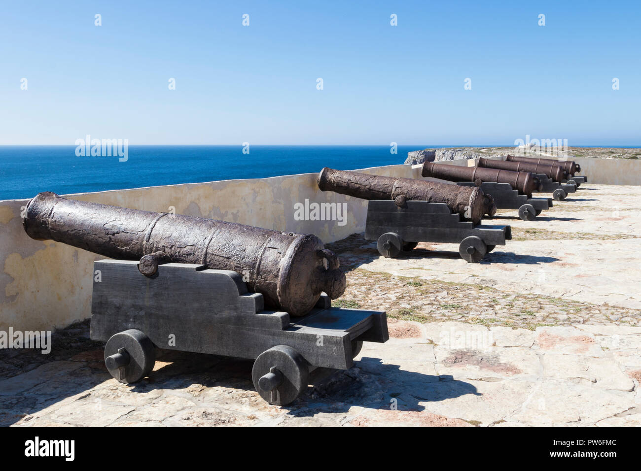 A line of old cannons in a fortress of Portugal in Sagres Stock Photo