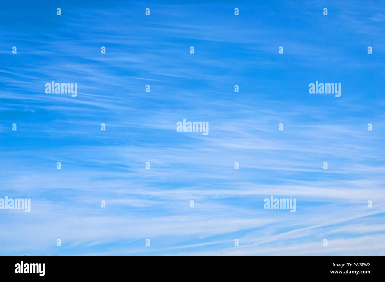 Beautiful blue sky with fleecy clouds. Abstract background. Stock Photo