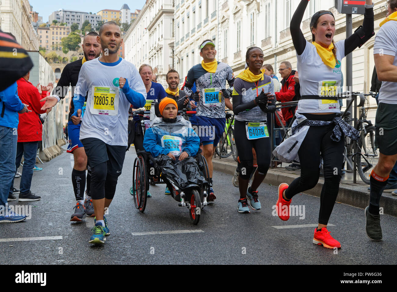LYON, FRANCE, October 7, 2018 : Marathon in the streets of Lyon under the  rain. "Run In" is a Festival of Running which takes place in the most  beauti Stock Photo - Alamy