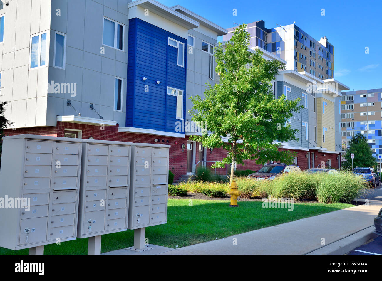 Mail boxes in front of modern, contemporary apartment (Erie Harbor