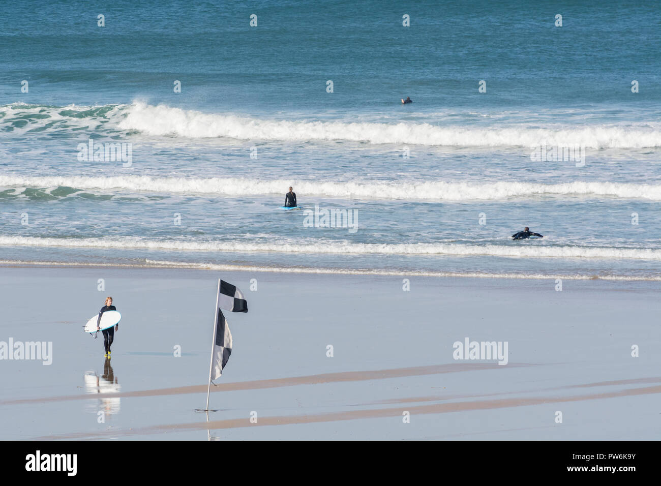 Surfers at Newquay, Cornwall - home of Boardmasters Festival. Stock Photo