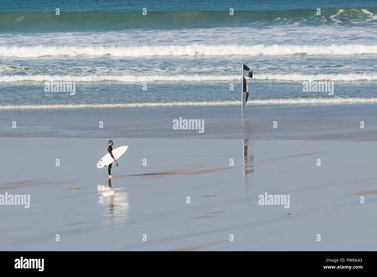 Surfers at Newquay, Cornwall - home of Boardmasters Festival. Stock Photo