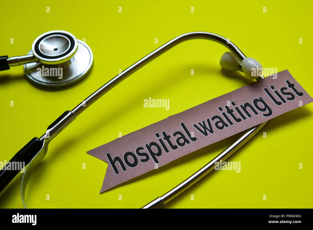 Hospital waiting list with stethoscope concept inspiration on yellow