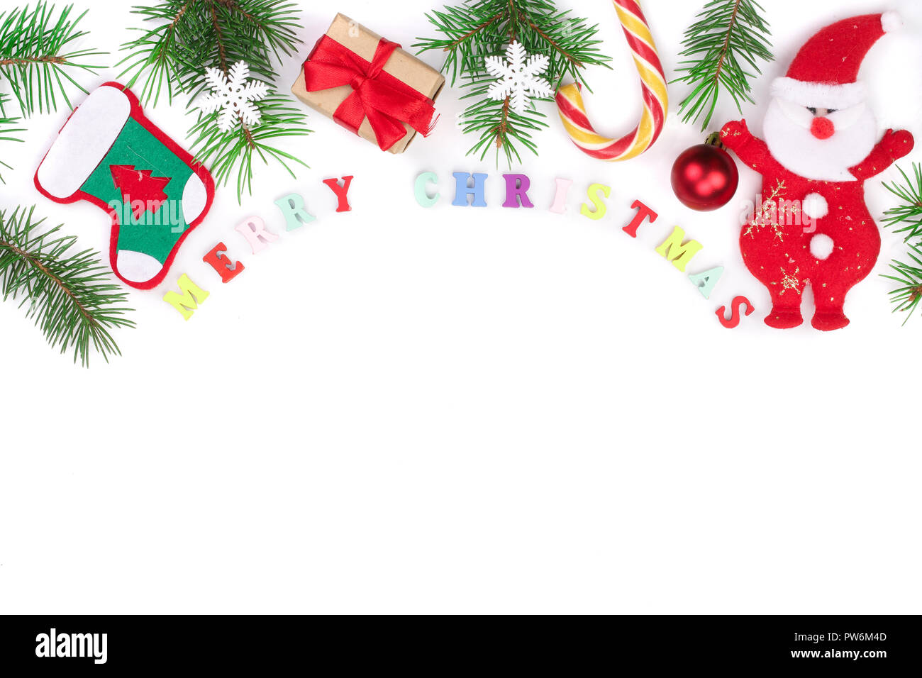 merry christmas inscription in frame made of fir branches isolated on ...