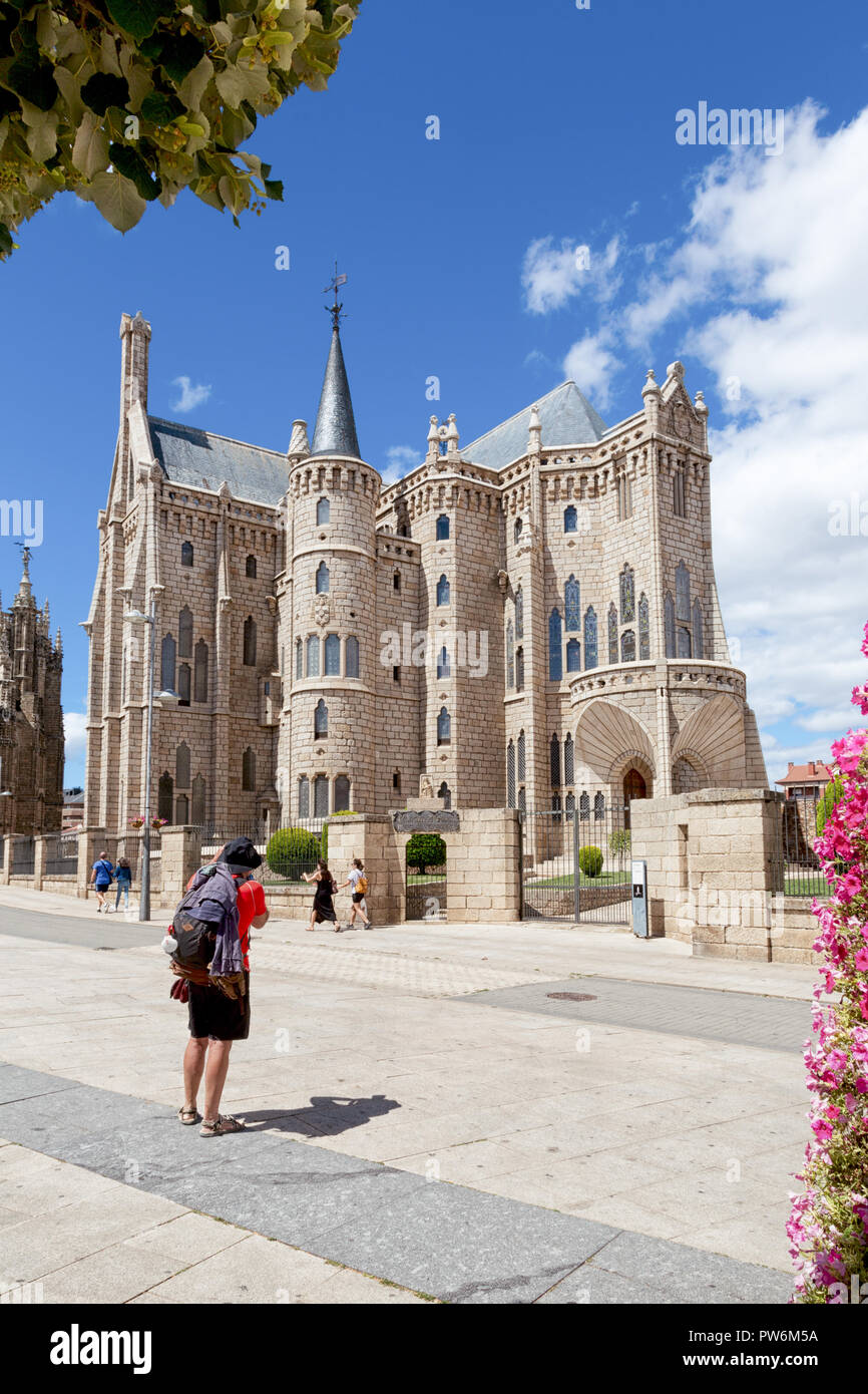 Astorga (Spain) - View of the gothic cathedral of Astorga, and a pilgrim along the Saint James way Stock Photo