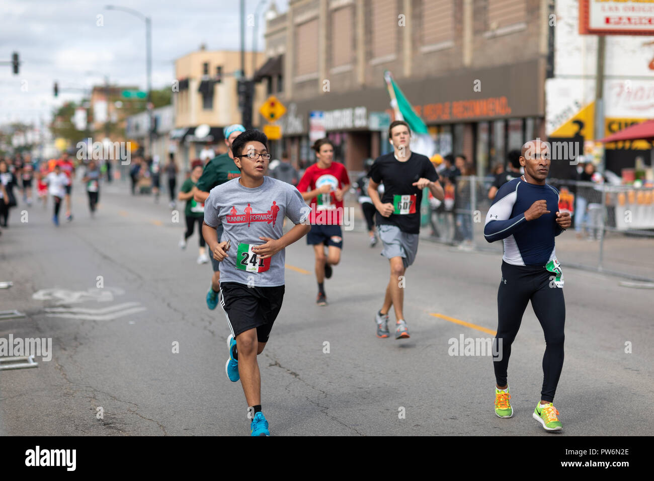 Chicago, Illinois , USA - September 9, 2018, El Grito 5K at la Villita, family run walk, men and women running in the annual 5 kilometers race, prior  Stock Photo