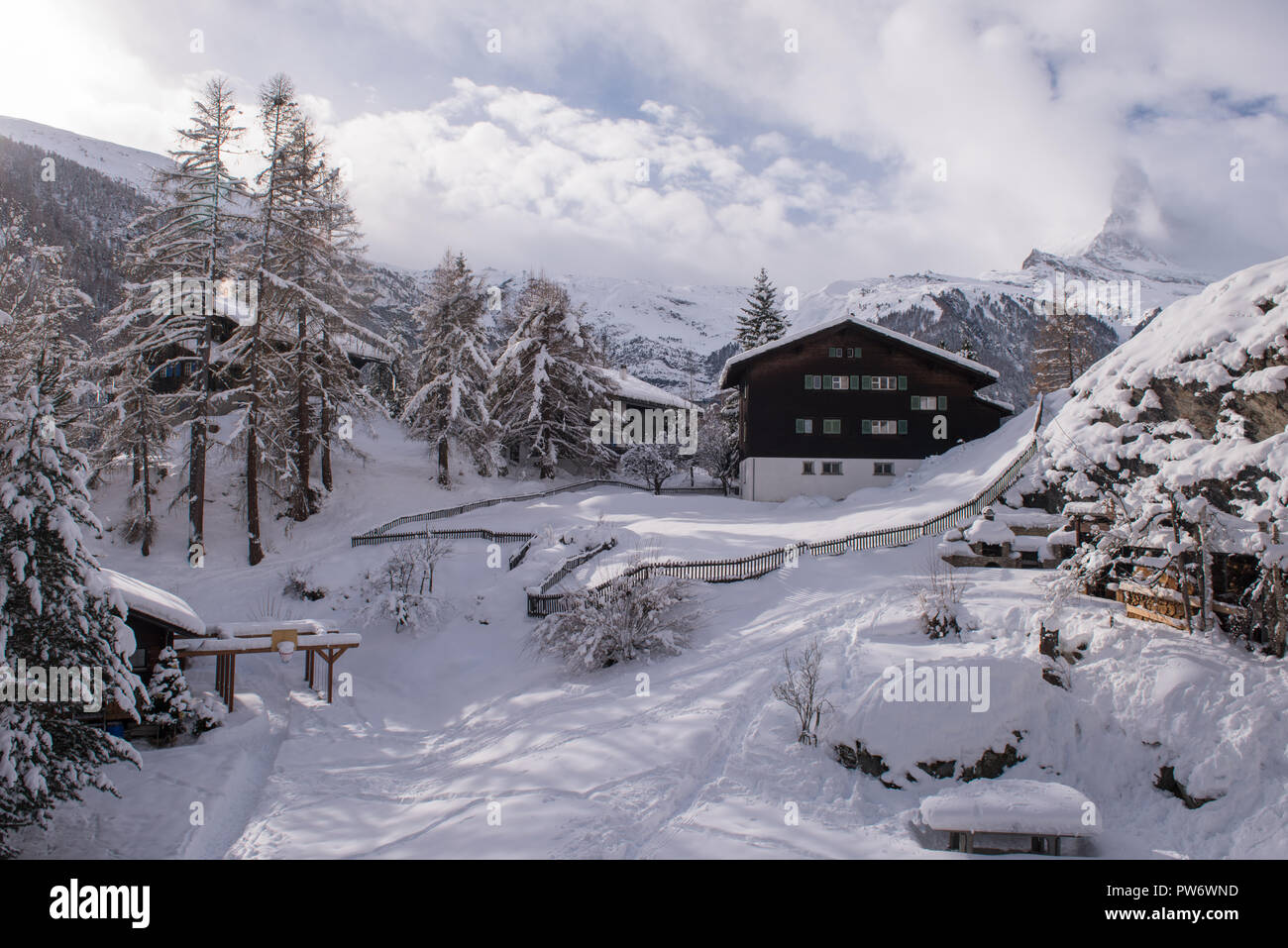 A Beautiful Landscape With Mountain Houses At Cold Winter Day