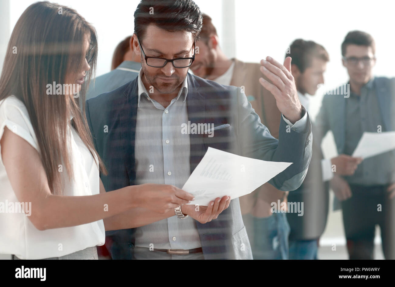 boss and assistant to discuss the work schedule Stock Photo