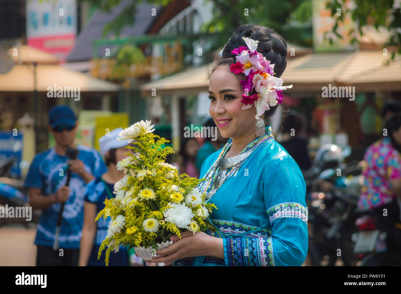 Chiang Rai, Thailand -April 13, 2018: Songkran festival at Suan Tung Lae Khom Chiang Rai Park in Chiang Rai. Participants in Songkran Festival parade. Stock Photo