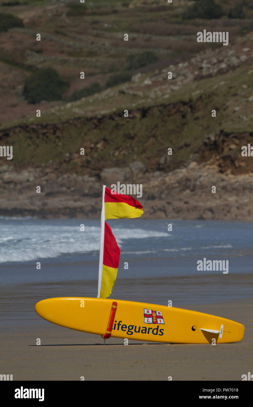 RNLI surfboard on the beach in Cornwall Stock Photo