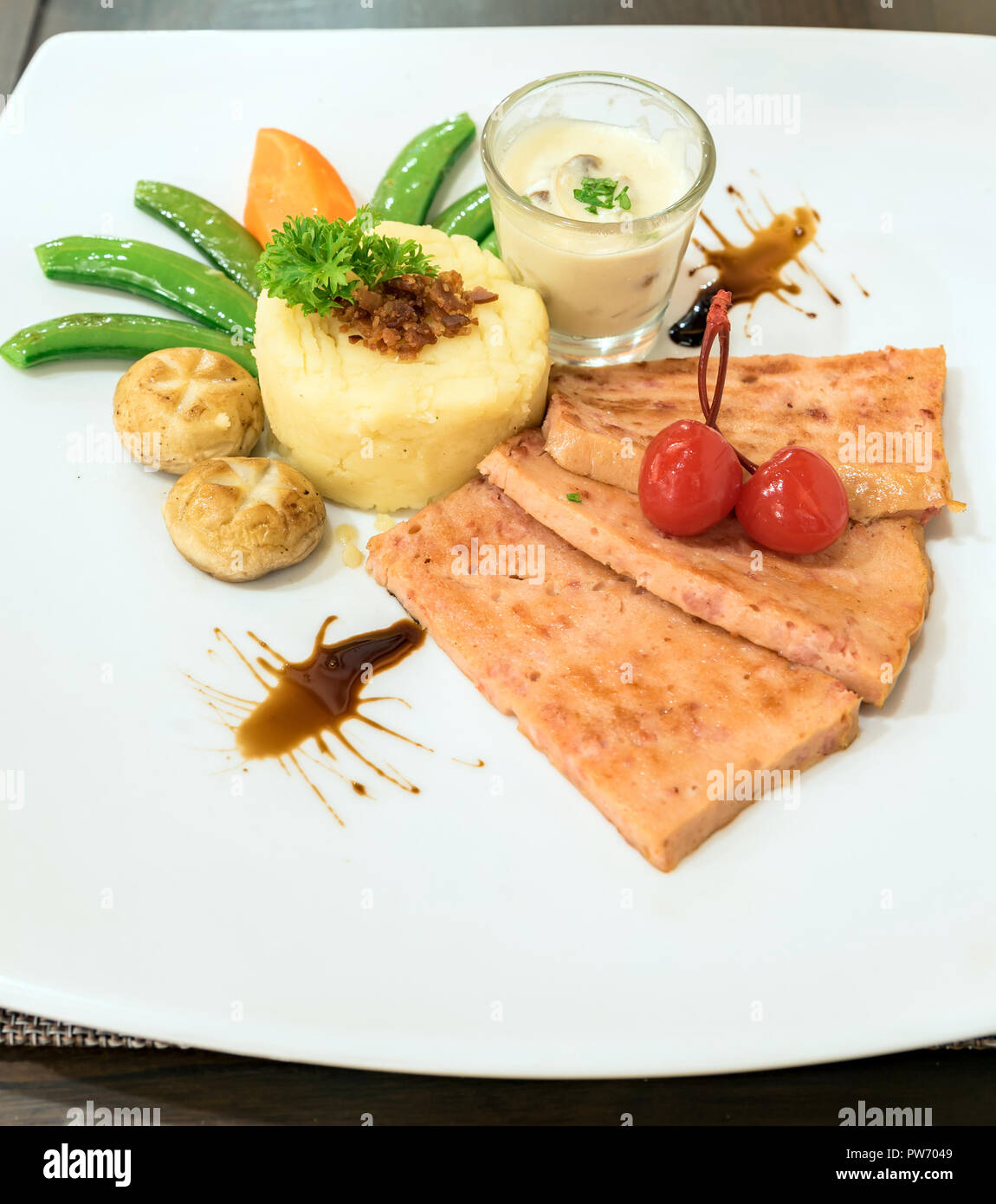 Ham Steak with mashed potato Stock Photo - Alamy