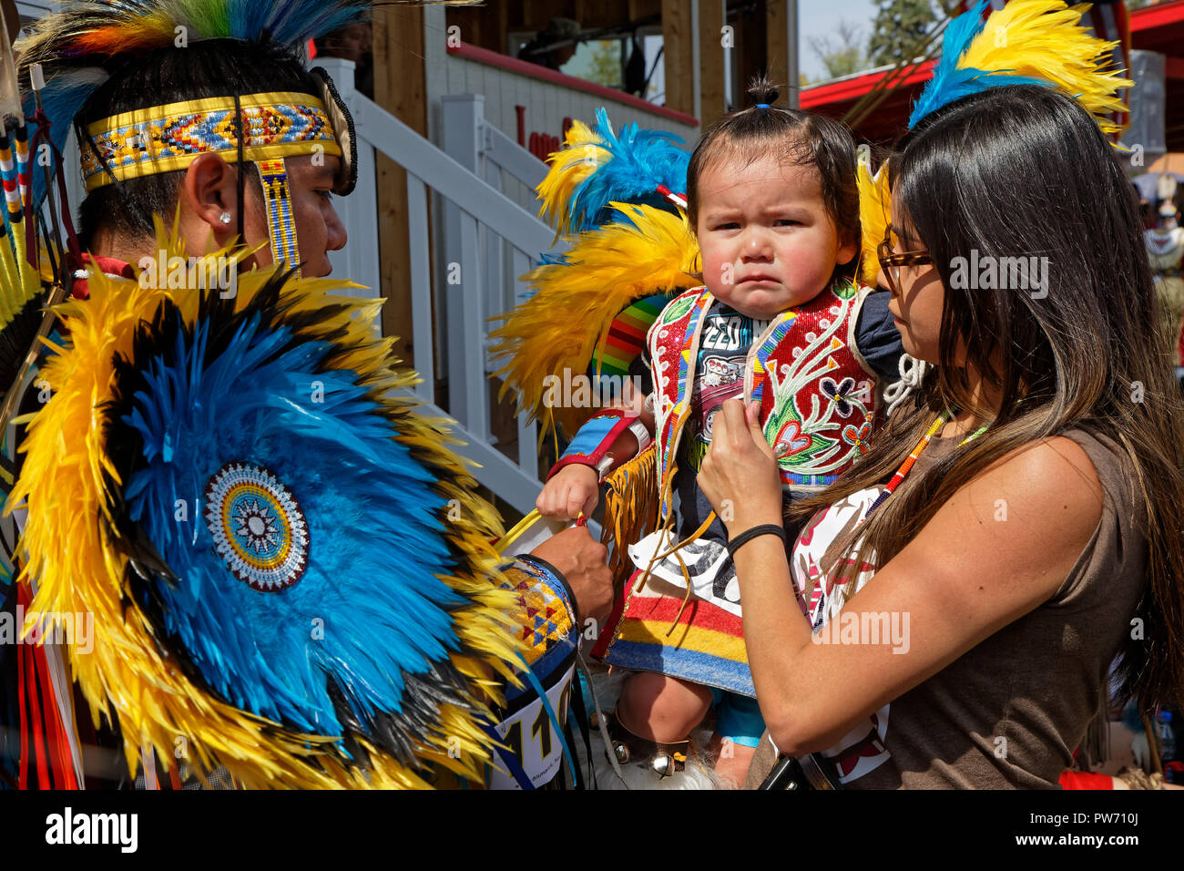 BISMARK, NORTH DAKOTA, September 8, 2018 : A family at the 49th annual United Tribes Pow Wow, one large outdoor event that gathers more than 900 dance Stock Photo