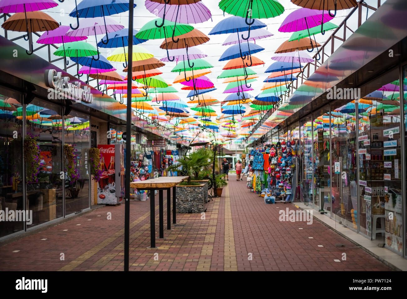 ADLER, RUSSIA - SEPTEMBER, 2018: alley soaring Umbrellas in Sochi. This location is popular with tourists. Stock Photo
