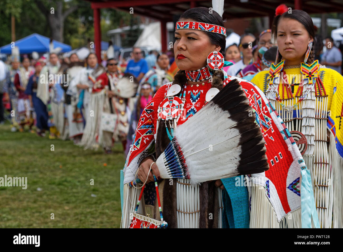 BISMARK, NORTH DAKOTA, September 9, 2018 : Women dancers of the 49th annual United Tribes Pow Wow, one large outdoor event that gathers more than 900  Stock Photo