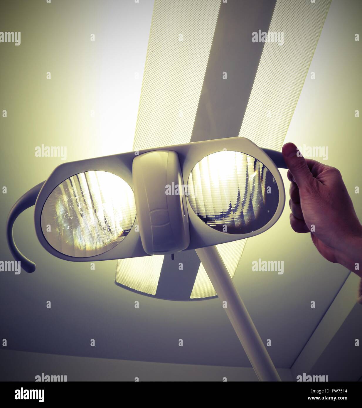 Powerful Lamp In An Operating Room With A Doctor S Hand And
