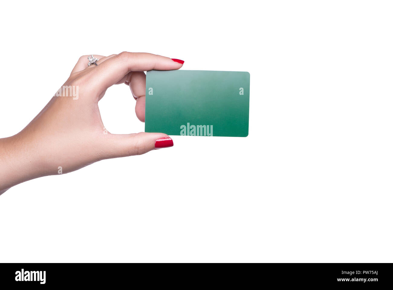 Female hand holding blank green card isolated on white background. Stock Photo