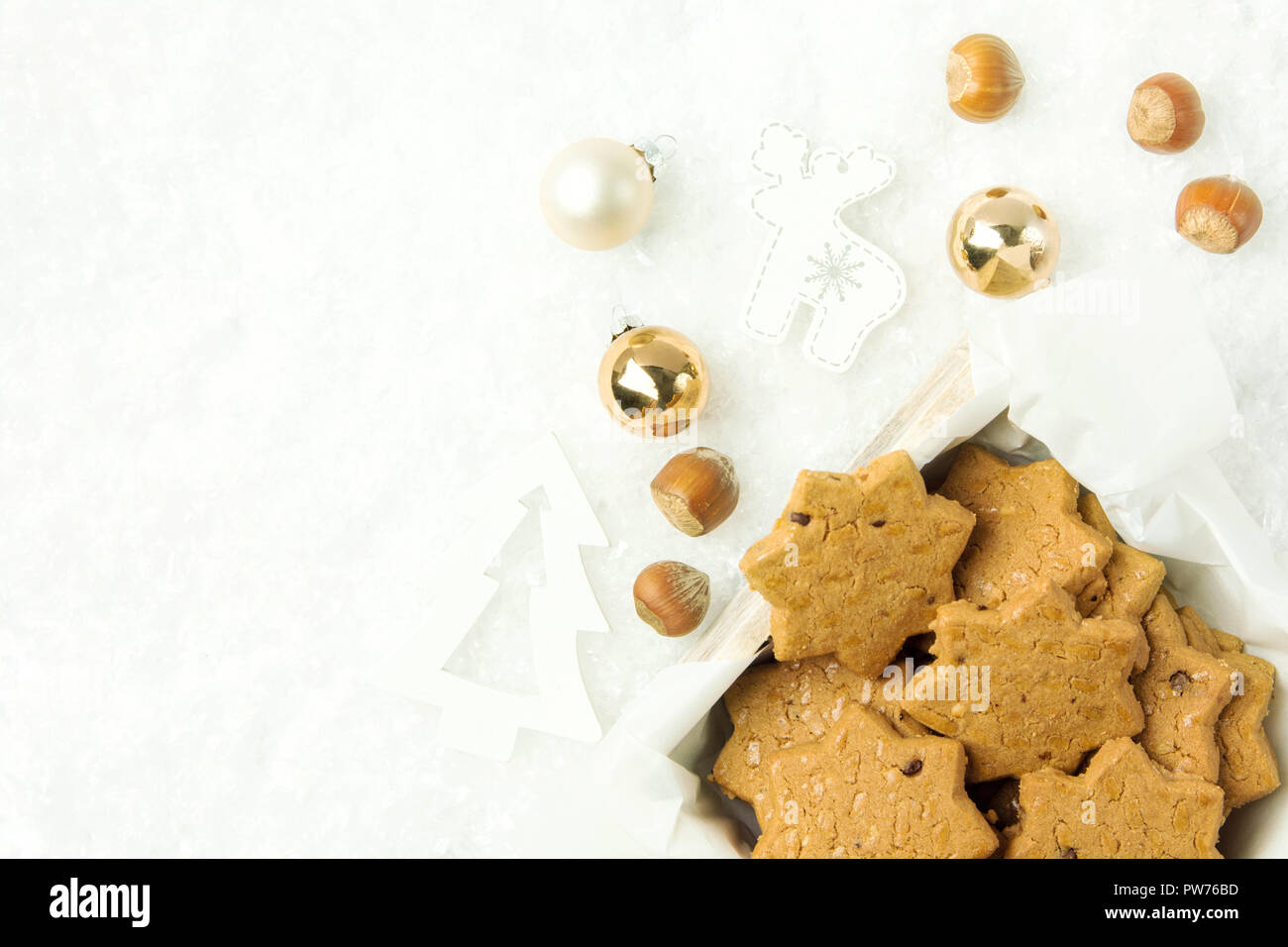 Christmas shortbread cookies with hazelnuts in star shape in wooden box ...