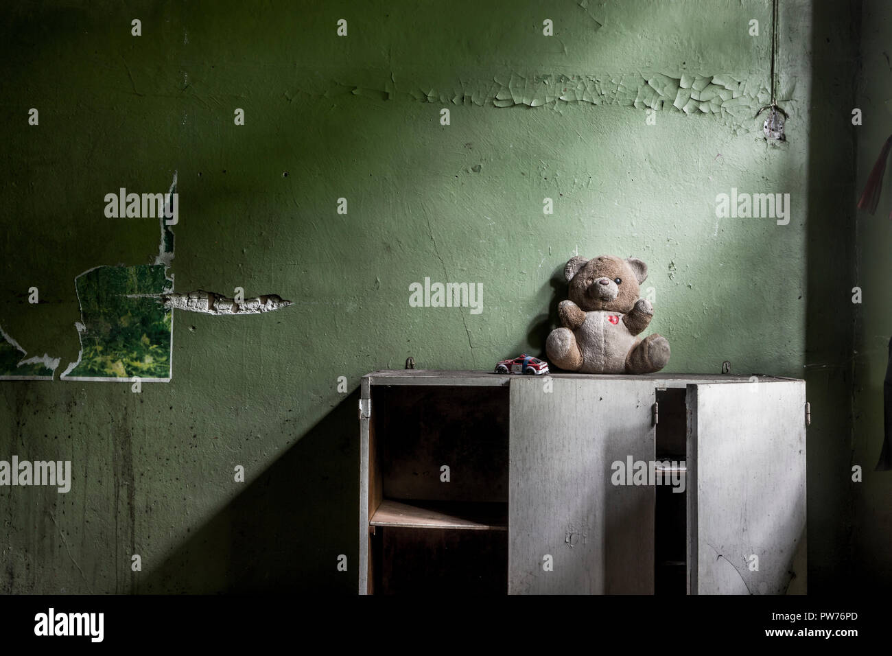 Kuldiga, Latvia. 19th August, 2014. Forgotten toys in an abandoned home in Kuldiga, Latvia. Stock Photo