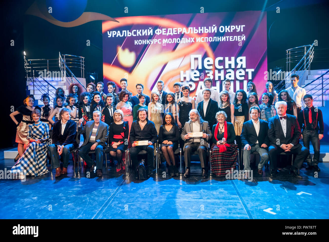Tyumen, Russia - April 16, 2014: Competition of young performers the Song knows no limit in dramatic theater. Group photography of participants, organ Stock Photo
