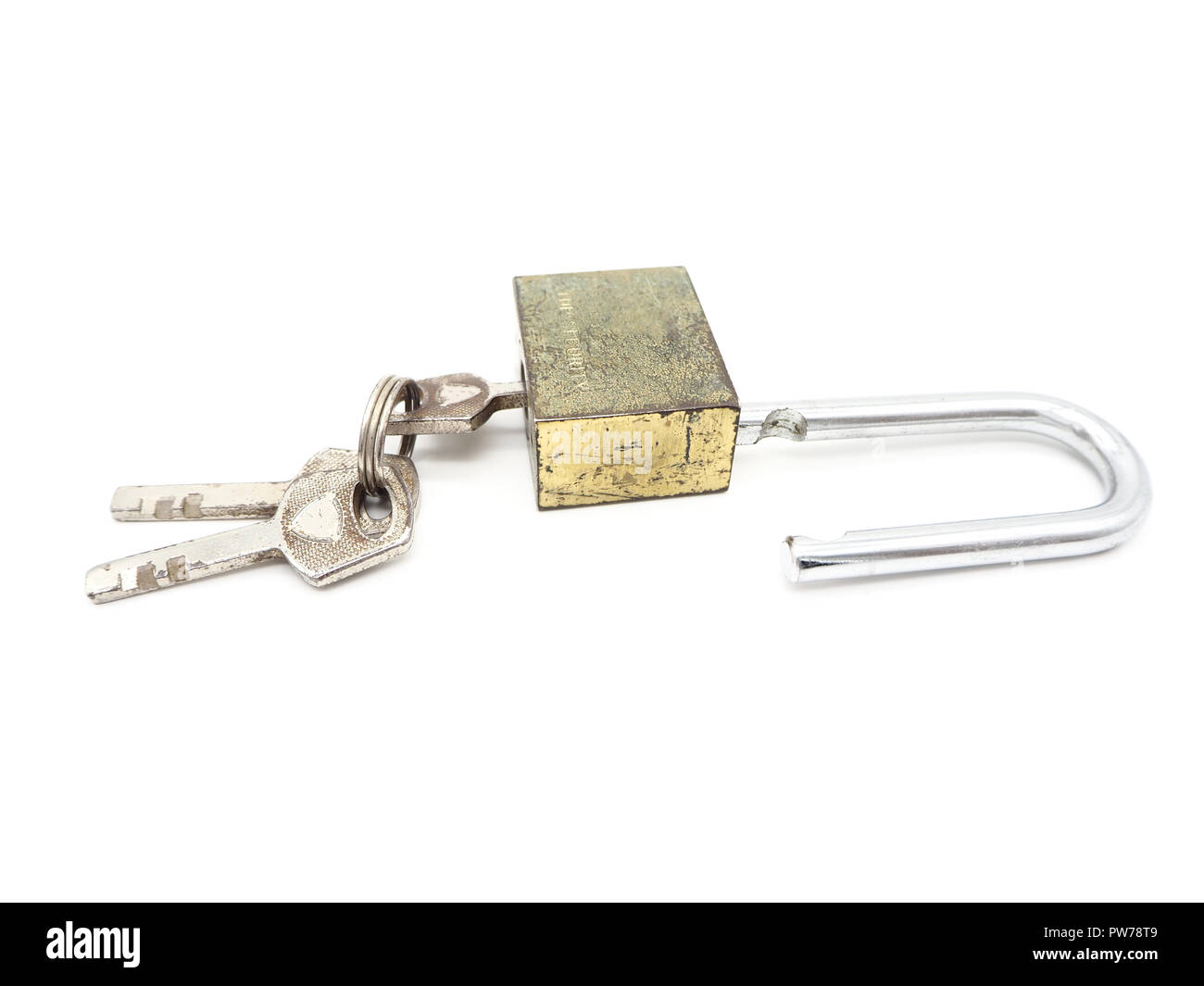 Keys stuck in a old lock isolated on a white background Stock Photo Alamy