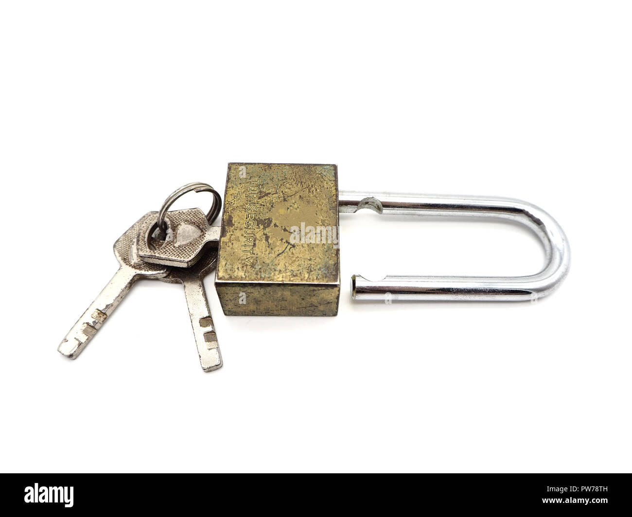 Keys stuck in a old lock isolated on a white background Stock Photo Alamy