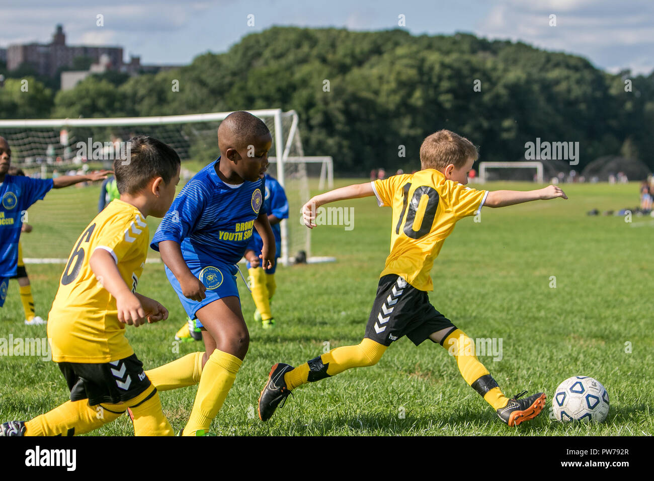 New York , September 29, 2018: 7 and 8 year old boys are playing a league soccer game. Stock Photo