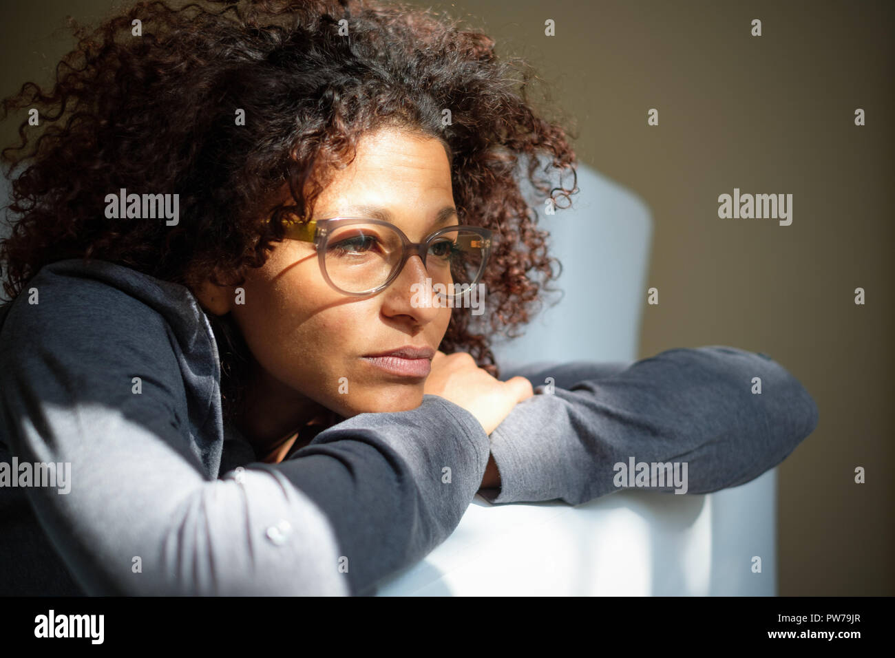 Thoughtful black woman hi-res stock photography and images - Alamy