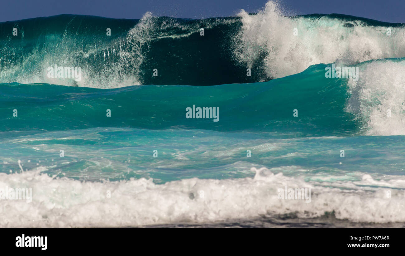 Crashing waves in tropical turquoise water. Stock Photo