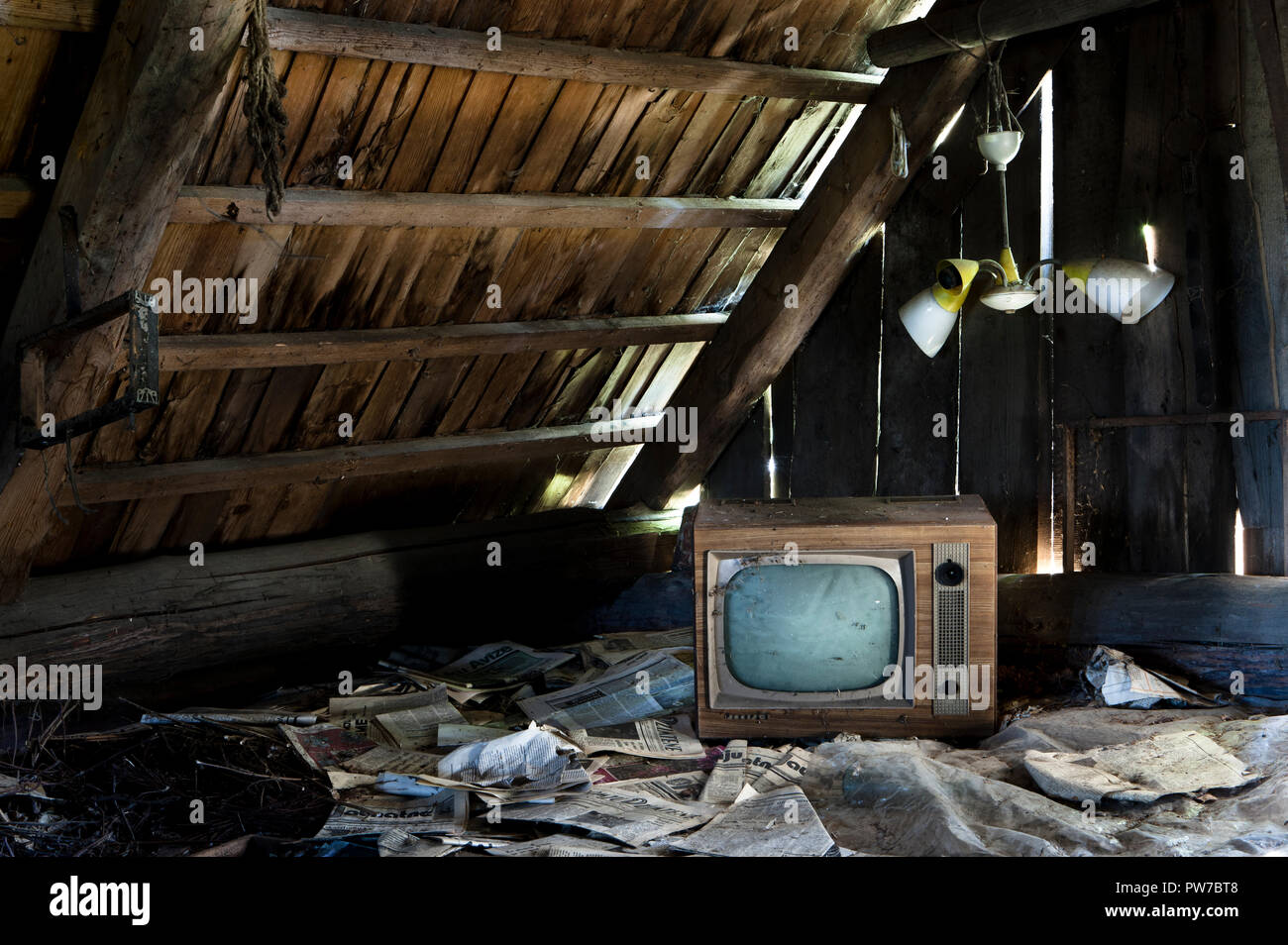 15th September, 2014. An old black and white television stored in an attic of an abandoned house in Skrunda, Latvia. Stock Photo