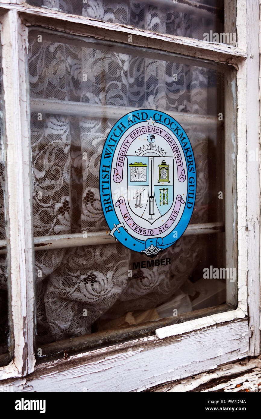 The badge of The British Watch & Clock Makers' Guild Stock Photo Alamy