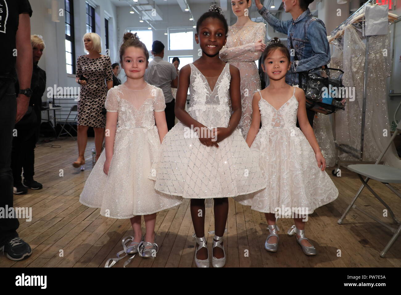 NEW YORK, NY - APRIL 13: Models posing backstage before the Berta Bridal Spring 2019  Fashion show on April 13, 2018 in New York City. Stock Photo