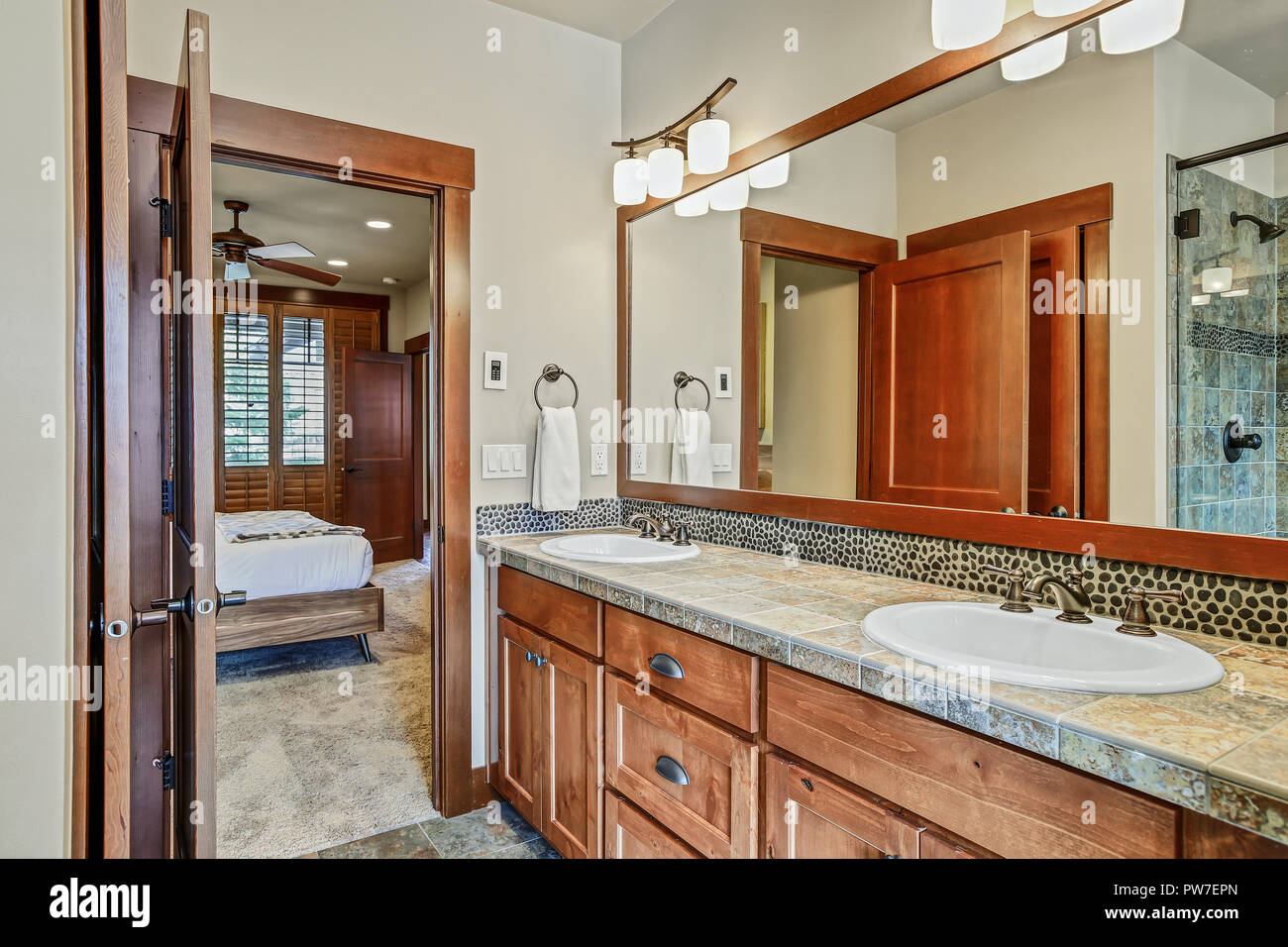 Double Vanity Cabinet In A Freshly Renovated Bathroom Stock Photo
